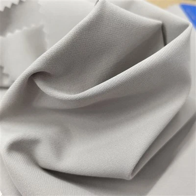 75D polyester + 50D T800 varp-stickat vanligt tyg